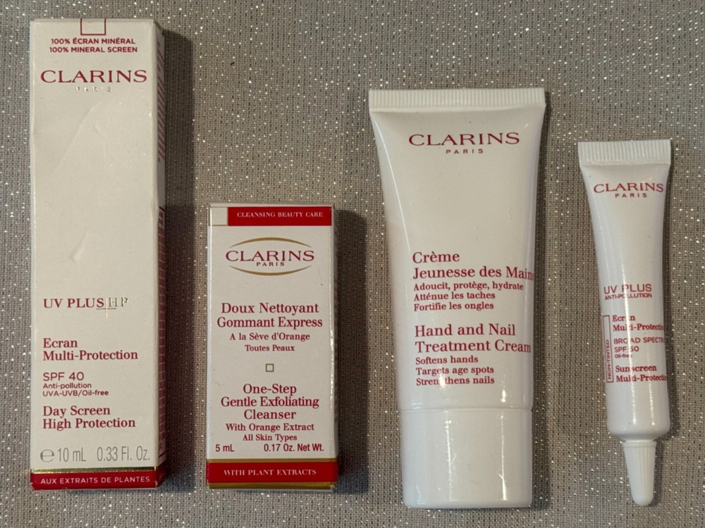 Clarins Skincare Sample Lot— Cleanser, Ecran Multi-Protection, Hand/Nail-4 piece